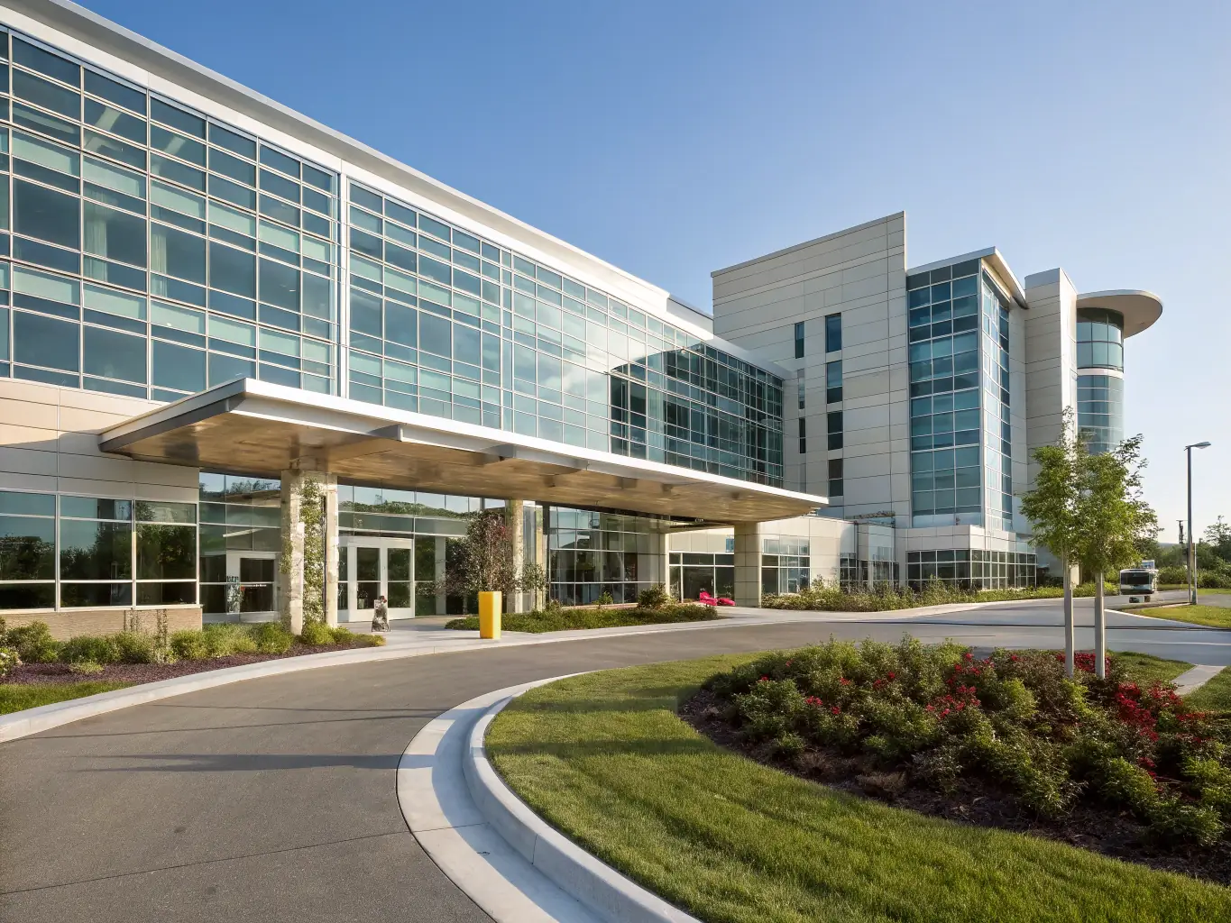 A modern hospital exterior in Zurich, Switzerland, showcasing clean architectural lines and surrounded by green spaces, representing high-quality European healthcare.